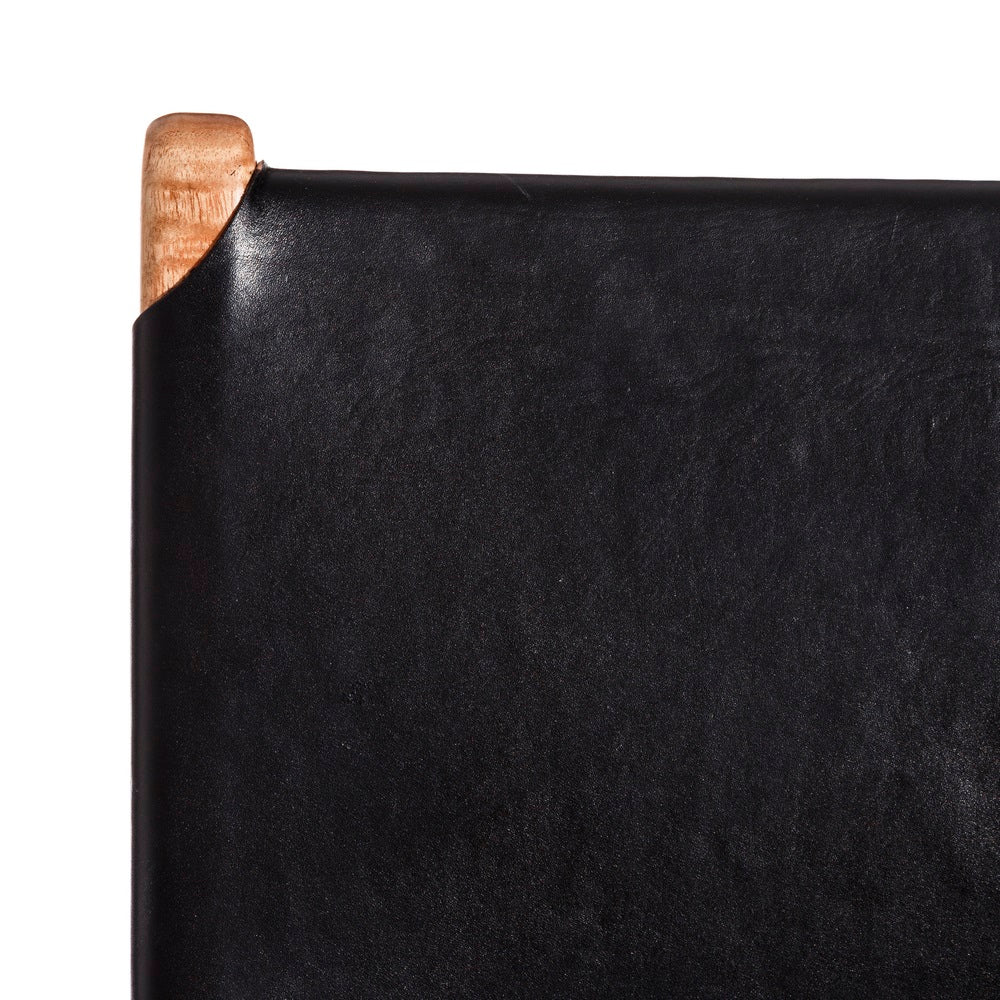 Silla de madera maciza de teca y piel negra