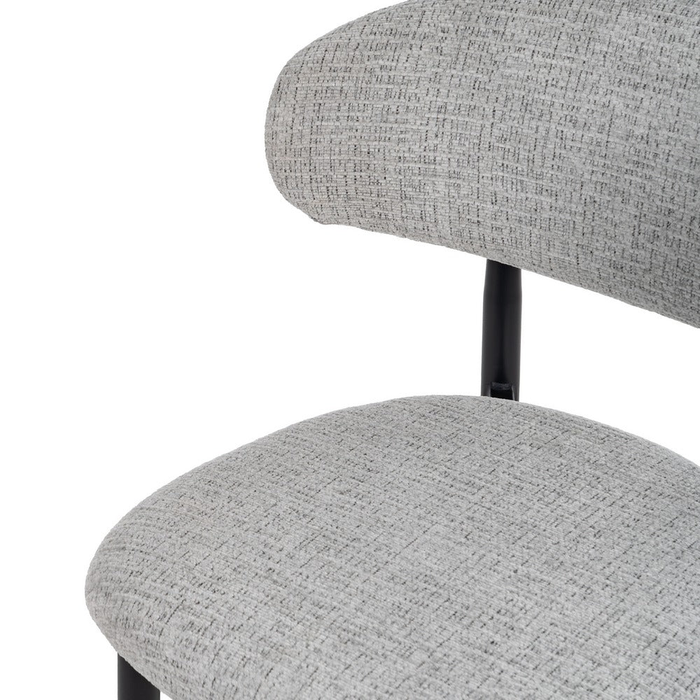 Taburete tapizado gris con estructura metálica